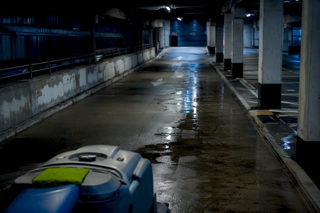After-hours cleaning in an empty car park