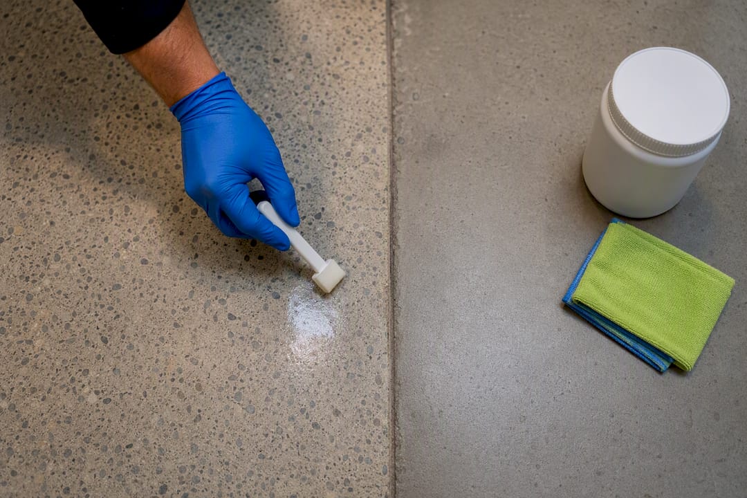 Cleaner testing degreaser on concourse flooring