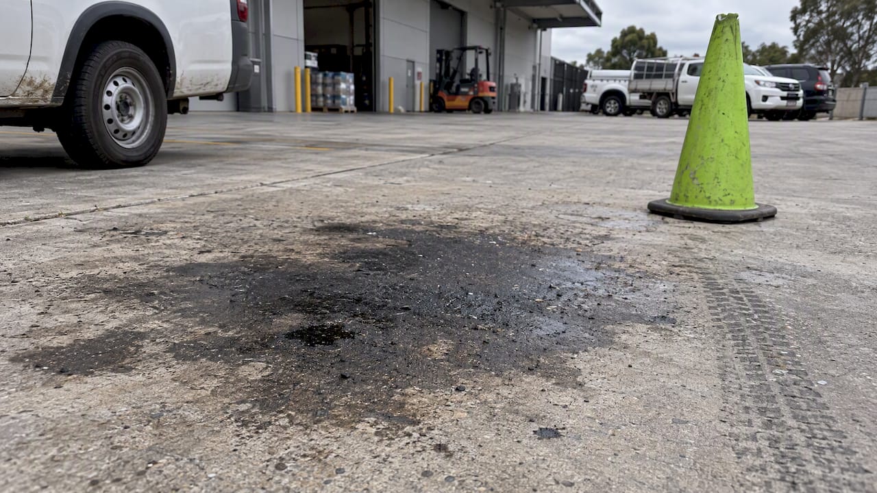 Grease stain on commercial pavement